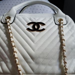 white medium purse with strap
